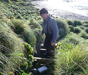 Expeditioner working on track steps