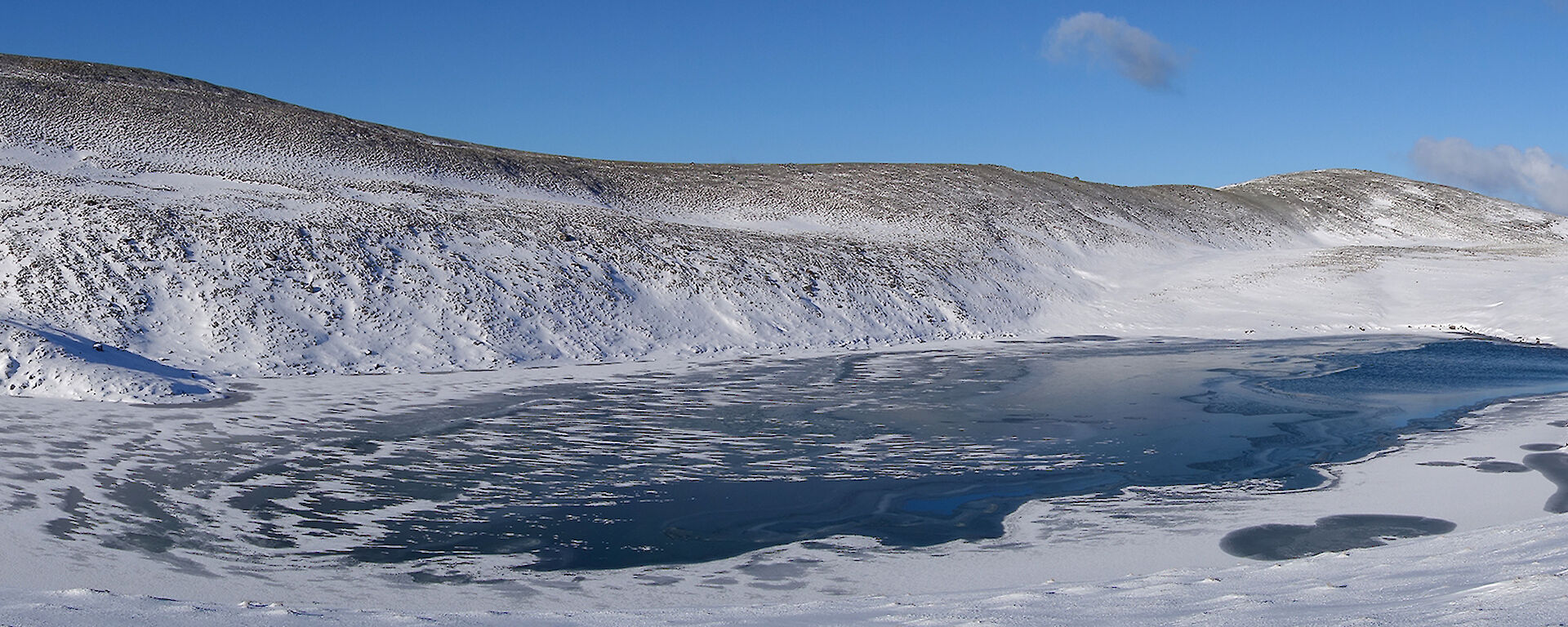 Semi-frozen lake near Mt Elder on the plateau