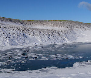 Semi-frozen lake near Mt Elder on the plateau