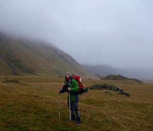 Expeditioner walking on featherbed country