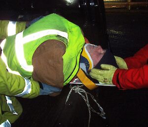 Graeme, on stretcher, being attended toby Ryan (protecting for a possible ‘neck injury’) as part of fire training exercise