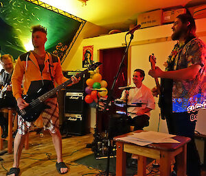 Live band at Macquari Island station with a punk rocker look