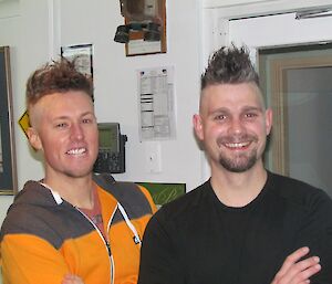 two expeditioners with mohawk haircuts