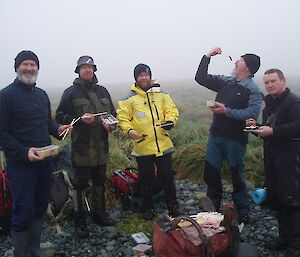 Expeditioners eating picnic lunch