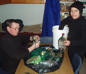 Chris and Evelyn sort and count the Bauer Bay marine debris collection