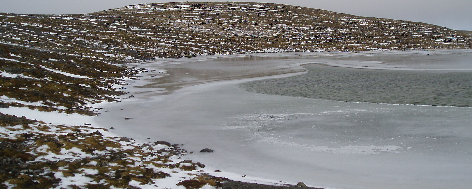 Frozen lake on the plateau near Mt Elder