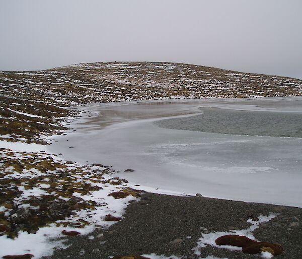 Frozen lake on the plateau near Mt Elder