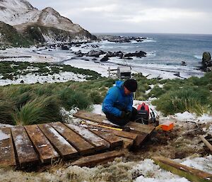 Chris repairing a boardwalk at Green Gorge hut