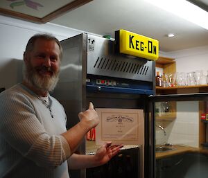 Paul with his award and the fridge