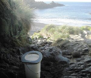 MacGyver’s folding toilet seat, Hurd Point — overlooking water and beach