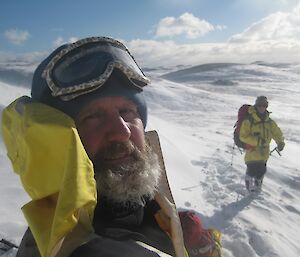 Two Macca expeditioners on the track