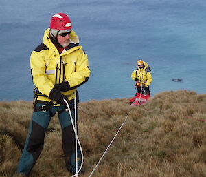 Scotty lowering Graeme on the main line