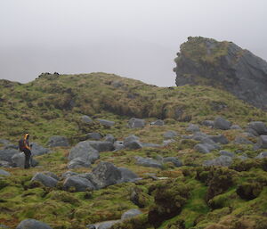 Mike searching around coastal rock stacks