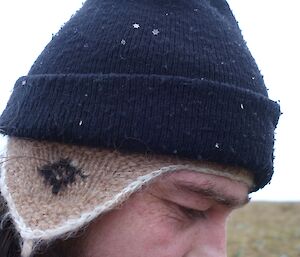 Star shaped snowflakes on Sean’s beanie