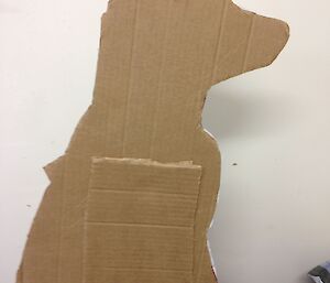 Cardboard silhouette of a labrador dog sitting
