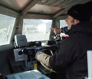 Pete instructs Ian on shore operations of the LARC