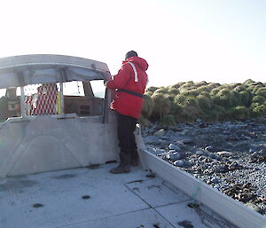 The LARC climbs up the shore