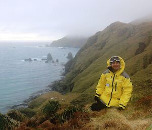 Expeditioner at Petrel Peak, overlooking Caroline Cove