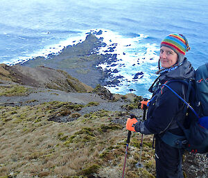 Meg arrives at the jump-down above Hurd Point, a picturesque hill leading down to the sea on a clear day