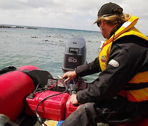 Coxswain Robbie at the helm