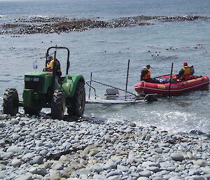 Launching a Zodiac IRB by tractor