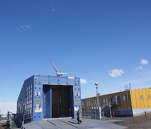 The met balloon rising higher in the sky whilst Director watches from the Balloon Shed apron