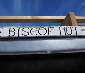 The name plate Biscoe Hut above the door