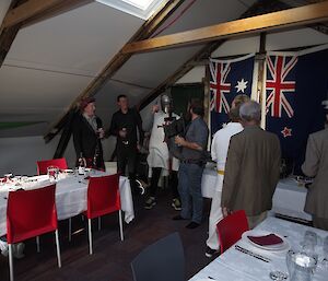 An expeditioner dressed as a Knight Templar making an entrance to the dinner