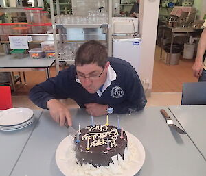 Blowing out the candles before making a wish