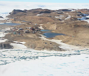Chinese Antarctic station Zhong Shan photographed from afar with snow surrounding it