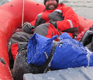 Trent J avoids icy spray in boat