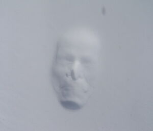 Face imprint in snow