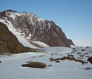 Mt Elliot, a dome shaped peak dusted with snow