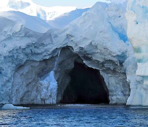 A cave in the ice cliffs along the coast