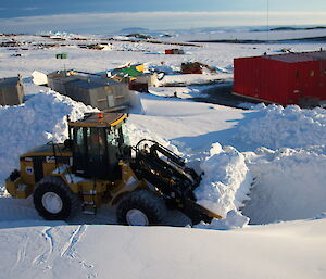 Clearing snow on roads.