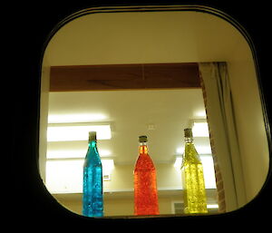 Coloured bottles in window