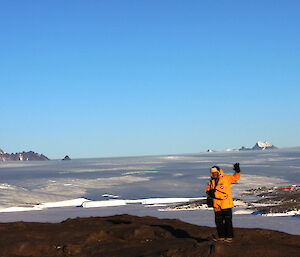 View from Welch Is. Expeditioner in the foreground, waving