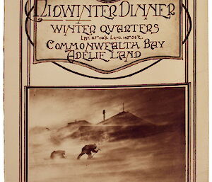 On the front cover of the midwinter menu is a photo from Mawson’s expediition of a man bending over in a blizzard.