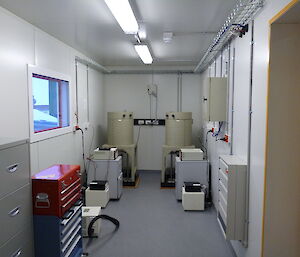 Cylindrical ARPANSA detectors inside a room