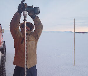 Trent drilling sea ice