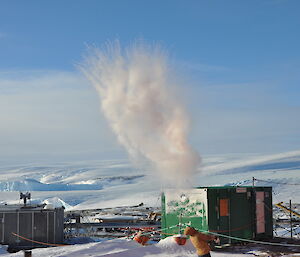 Shot of the station witha person throwing water up