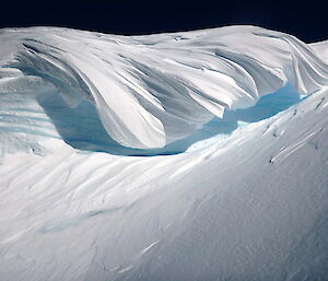 Cornice that looks like a huge white wave breaking