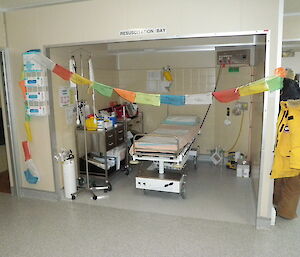 Prayer flags hung across the beds in the doctor’s surgery