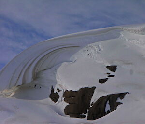 A layered cornice of snow on Peterson Island