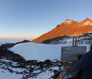 John Kelly painting at henderson hut