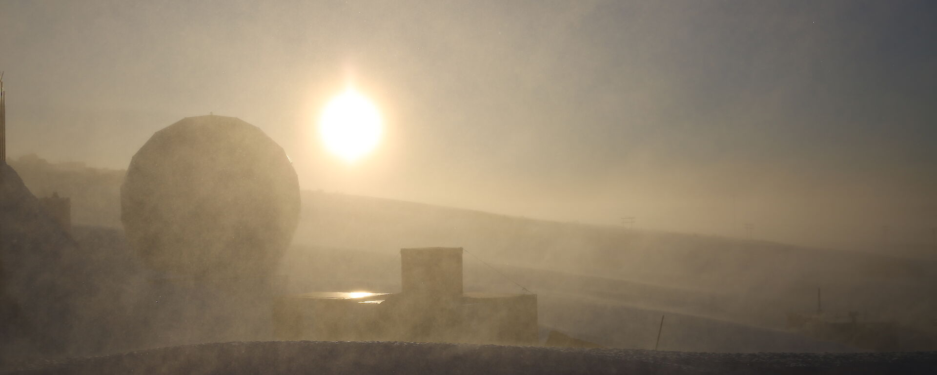 Sunset and blowing snow
