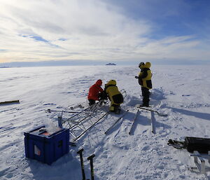 Metals rods of the Auto weather station laid out on the ice