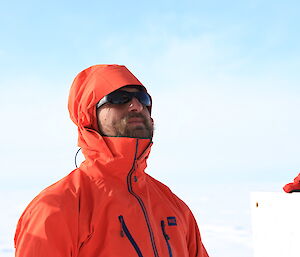 Stefan Vogel in red jacket and sunglasses.