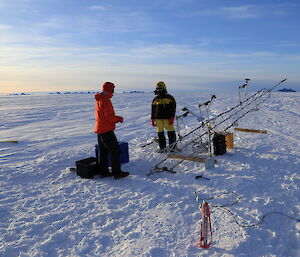 Auto weather station antennae assembled lying on the ice ready to liift into place.
