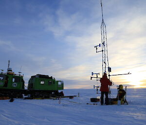 Sunset at midnight with a green Hagg vehicle and weather station raised.